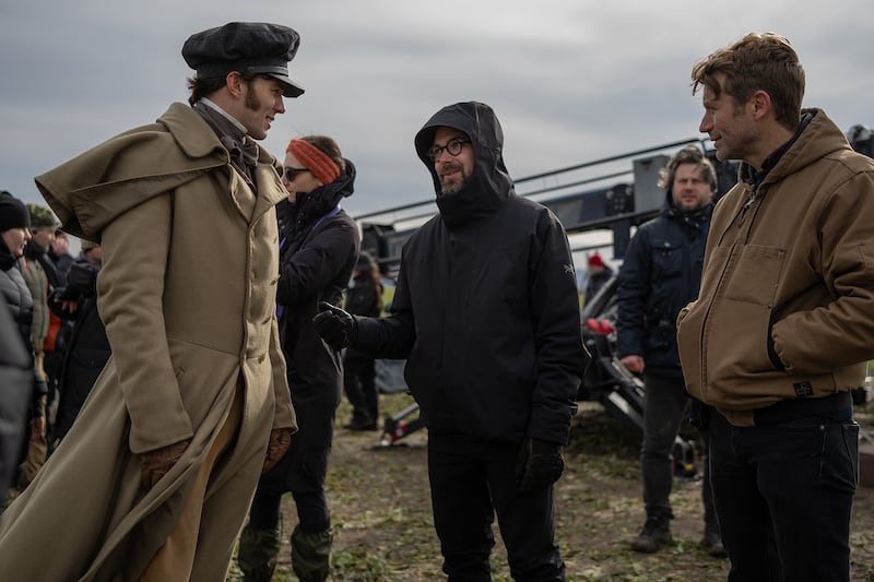 Actor Nicholas Hoult, director Robert Eggers, and director of photography Jarin Blaschke on set.
