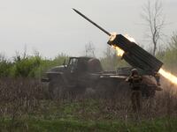 Ukrainian gunners fire rockets.