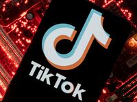 A smartphone with a displayed TikTok logo.