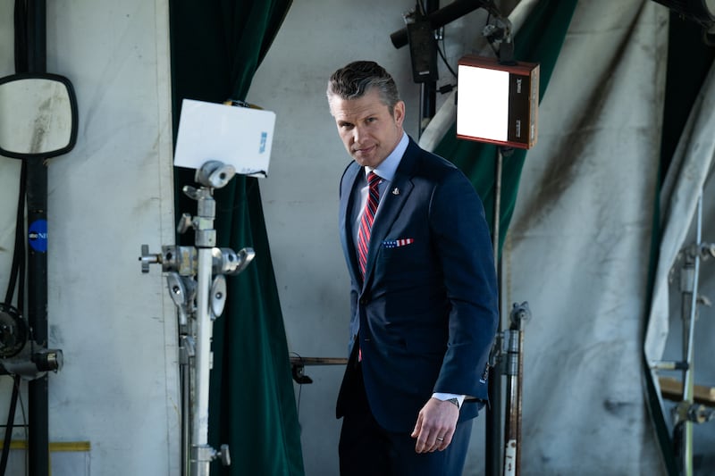 Defense Secretary Pete Hegseth walks away after being interviewed in front of the White House in Washington, DC.