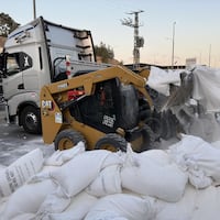 Humanitarian aid supplies dumped by Israeli settlers to road near Tarqumiyah military checkpoint in Hebron, West Bank on May 13, 2024.