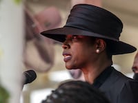 Martine Moïse speaks during the funeral for her husband, slain Haitian President Jovenel Moïse, on July 23, 2021.