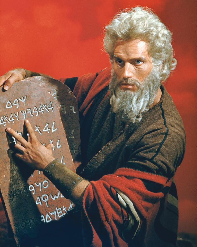 American actor Charlton Heston as Moses with the titular stone tablets in the biblical epic 'The Ten Commandments', directed by Cecil B. DeMille for Paramount, 1956. (Photo by Silver Screen Collection/Hulton Archive/Getty Images)