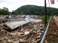 Debris piled on the bridge from Lake Lure to Chimney Rock in North Carolina after Hurricane Helene.