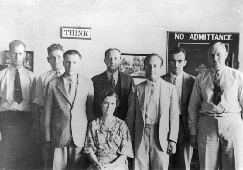 Portrait of members of the US Army's Signals Intelligence Service, mid 1930s. Pictured are, from left, Herrick F. Bearce, Dr Solomon Kullback (1907 - 1994), US Army Captain Harold G. Miller (also identified in some sources as Herrod G. Miller), department head William F. Friedman (1891 - 1969)(standing), Louise Newkirk Nelson (also identified as Anna Louise Newkirk)(sitting), Dr Abraham Sinkov (1907 - 1998), US Coast Guard lieutenant L.D. Jones (also identified as L.T. Jones), and Frank B. Rowlett (1908 - 1998). (Photo by Fotosearch/Getty Images)