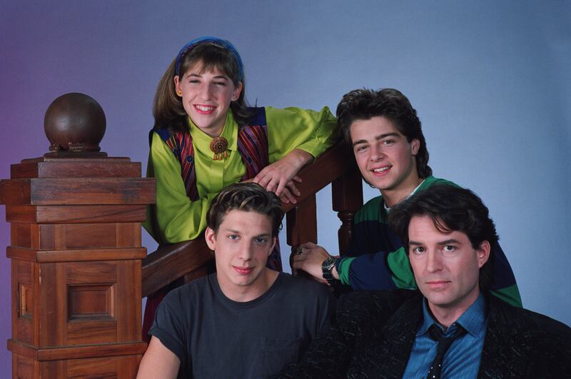 Mayim Bialik rose to fame portraying Blossom Russo in "Blossom." Pictured here with cast members Joseph Lawrence, Ted Wass, and Michael Stoyanov in 1990.
