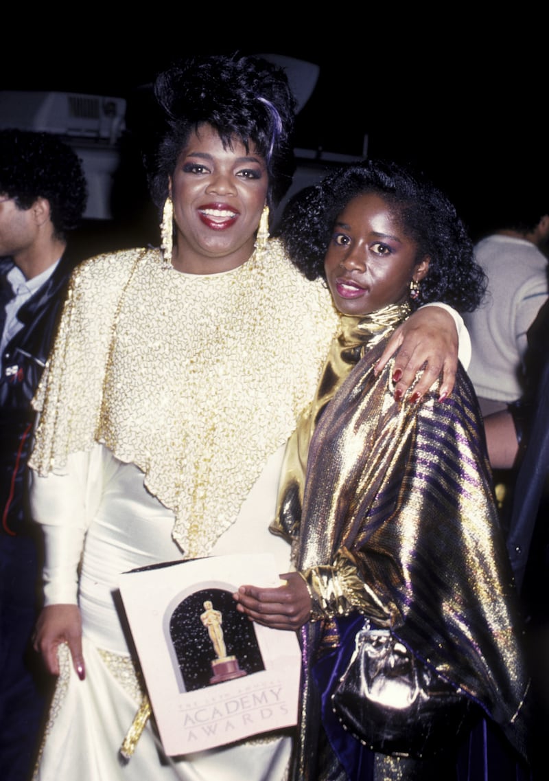 Oprah Winfrey said her gala dress left a scar on her neck. Pictured with her “The Color Purple” co-star Akosua Busia at the 58th Annual Academy Awards in 1986 in Los Angeles.