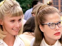 Olivia Newton-John as Sandy Olsen and Susan Buckner as Patty Simcox