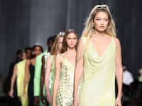 MILAN, ITALY - SEPTEMBER 22: Gigi Hadid and models walk the runway at the Versace fashion show during the Milan Fashion Week Womenswear Spring/Summer 2024 on September 22, 2023 in Milan, Italy. (Photo by Daniele Venturelli/WireImage)