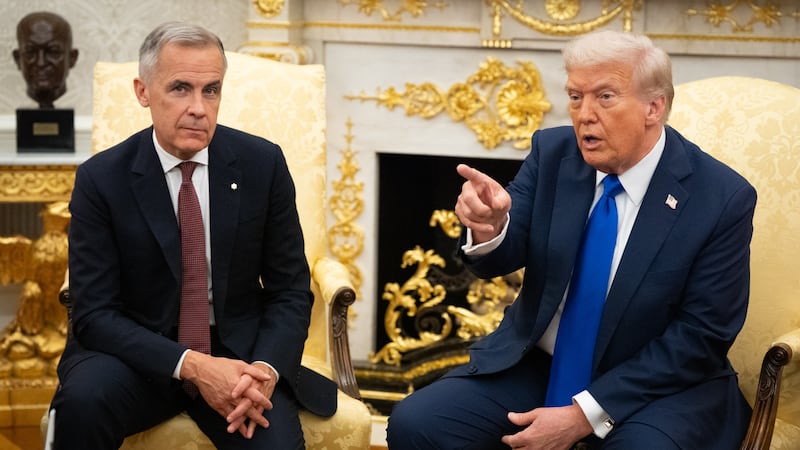 WASHINGTON,DC - U.S. President Donald Trump met with Canadian Prime Minister Mark Carney in the Oval Office of the White House, Oct. 7, 2025, in Washington.(Photo by Sarah L. Voisin/The Washington Post via Getty Images)