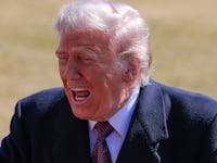 President Donald Trump, pictured speaking to the media on the South Lawn of the White House on February 27, 2026, attacked Anthropic as a "radical left woke" company and demanded the U.S. government cut ties with the AI giant amid a standoff between the tech company and the Pentagon.