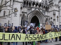 WikiLeaks founder Julian Assange’s supporters stand outside the High Court on Feb. 20, when he was too sick to attend a hearing.