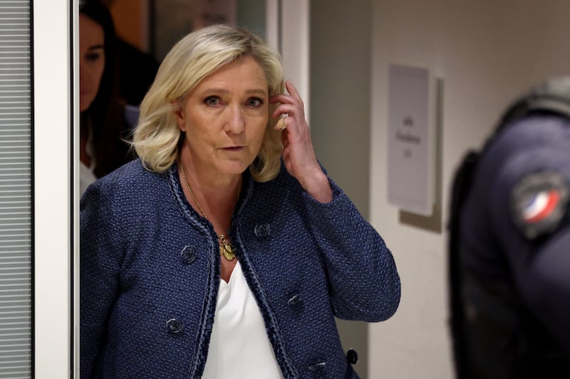 French far-right Leader Marine Le Pen leaves the courtroom after a guilty verdict in her embezzlement case trial on March 31, 2025 in Paris, France.