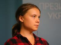Greta Thunberg was arrested and charged with disobeying police for a protest in the Swedish city of Malmö