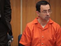 Larry Nassar sits in court listening to statements before being sentenced by Judge Janice Cunningham for three counts of criminal sexual assault in Eaton County Circuit Court on February 5, 2018 in Charlotte, Michigan.