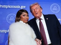 Rapper Nicki Minaj joined President Donald Trump on stage as he deliversed remarks during the Treasury Department's Trump Accounts Summit at Andrew W. Mellon Auditorium on January 28, 2026 in Washington, DC.
