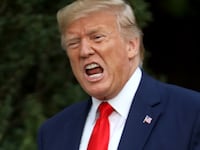 WASHINGTON, DC - OCTOBER 03: U.S. President Donald Trump shouts at members of the media as he returns to the White House on October 03, 2019 in Washington, DC. Trump traveled to Florida earlier in the day. (Photo by Win McNamee/Getty Images)