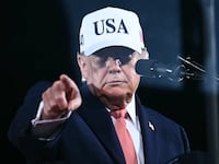 US President Donald Trump points as he speaks at a midterm campaign rally at Pitt-Greenville Airport in Greenville, North Carolina, on October 20, 2026. (Photo by Kent NISHIMURA / AFP via Getty Images)