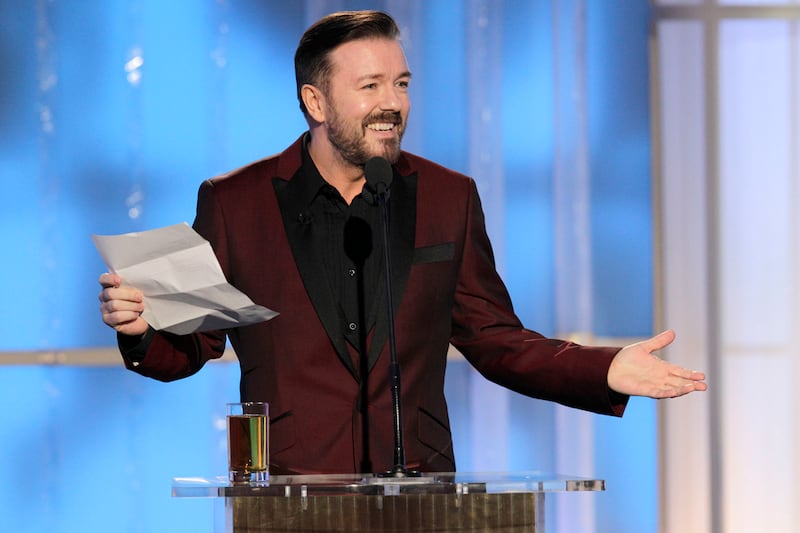articles/2012/01/16/the-gaudy-gauche-and-sometimes-corrupt-greatness-of-the-golden-globes/golden-globe-awards-ricky-gervais-rushfield_yhir6v