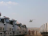 articles/2014/08/14/putin-s-freshly-painted-humanitarian-aid-convoy-nears-ukraine/140814-nemtzova-ukraine-convoy-tease_yvipfj