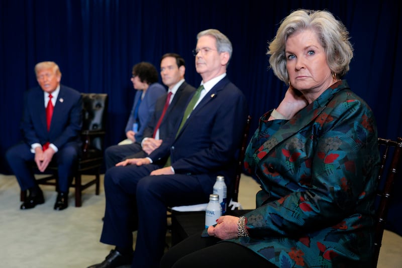White House Chief of Staff Susie Wiles (R) attends a bilateral meeting with President of Argentina Javier Milei and U.S. President Donald Trump