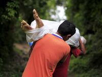 articles/2016/02/07/deporting-people-to-their-doom-in-murderous-central-america/160205-brigida-gangs-tease_uf22nv