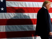 Donald Trump takes the stage for a campaign rally in Colorado Springs, Colorado, Oct. 18, 2016.