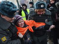 articles/2012/12/25/as-authorities-crack-down-activists-escape-from-russia/nemstova-russian-protest-tease_ickrkc