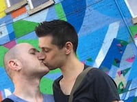 articles/2016/07/29/meet-the-couple-fighting-anti-gay-hate-one-kiss-a-day/160728-allen-two-men-kissing-tease_wkxqbr