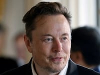 Elon Musk looks on as he attends a roundtable during the 6th edition of the “Choose France” Summit at the Chateau de Versailles, outside Paris, France on May 15, 2023.