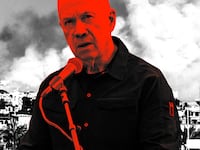 A photo illustration of Israeli Defense Minister Yoav Gallant in front of Gaza.