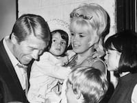 Actor Mickey Hargitay is obviously enjoying his reunion with his former wife, actress Jayne Mansfield, and their children July 19th, backstage at the Westbury, L. I. Music Fair, where Miss Mansfield opened in Gentlemen Prefer Blondes.
