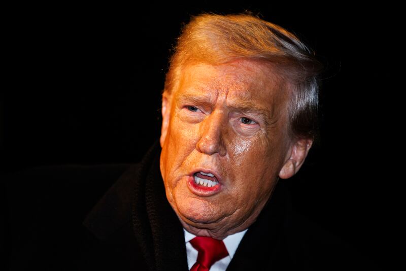 WASHINGTON, DC - JANUARY 20: U.S. President Donald Trump makes a brief statement to reporters before departing from the South Lawn of the White House in Marine One on January 20, 2026 in Washington, DC. President Trump is heading to Switzerland for the Davos Forum as tensions rise around Trumps rhetoric on Greenland. (Photo by Samuel Corum/Getty Images)