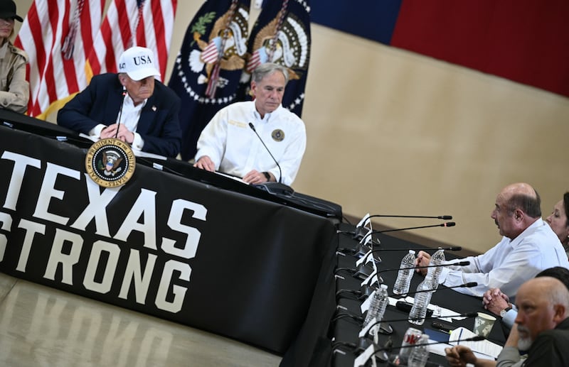 Dr. Phil McGraw praises President Donald Trump as First Lady Melania Trump and Texas Governor Greg Abbott look on.
