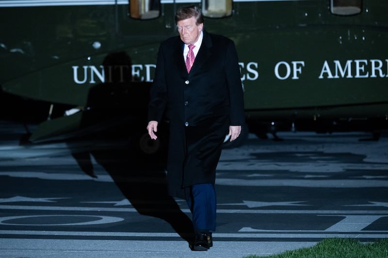 US President Donald Trump walks across the South Lawn after arriving on Marine One at the White House in Washington, DC, on October 18, 2026. President Trump is returning to Washington, DC, after campaigning in Georgia and Kentucky over the weekend. (Photo by SAUL LOEB / AFP via Getty Images)