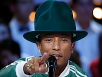 articles/2014/03/03/girl-review-pharrell-s-pleasant-unchallenging-dive-into-the-mainstream/140302-pharrell-album-tease_zhquoj