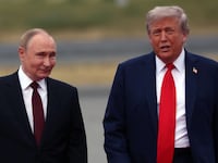 President Donald Trump welcomes Russian President Vladimir Putin to Joint Base Elmendorf-Richardson on August 15, 2025 in Anchorage, Alaska.