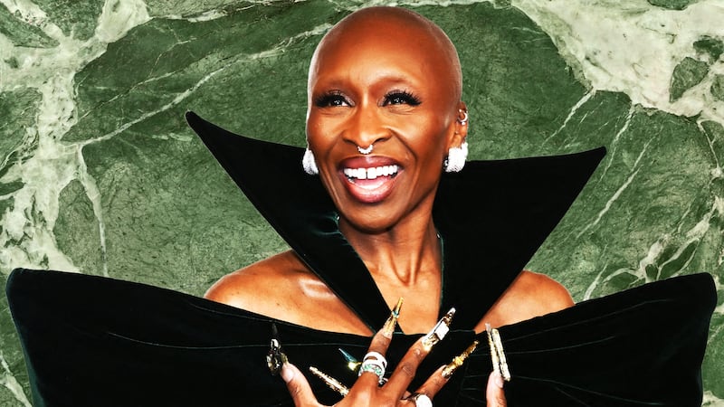 Cynthia Erivo on top of a green marble background