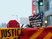 Protesters’ signs against Atlanta’s “Cop City.”