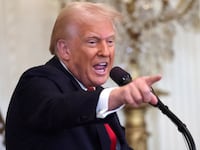 U.S. President Donald Trump gestures while speaking during a Women's History Month event in the East Room of the White House on March 26, 2025 in Washington, DC.