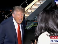 Trump lunges at ABC’s Rachel Scott.