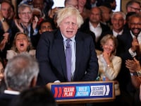 Former British Prime Minister Boris Johnson is applauded as he arrives to speak during a Conservative general election campaign event in London, Britain, July 2, 2024.