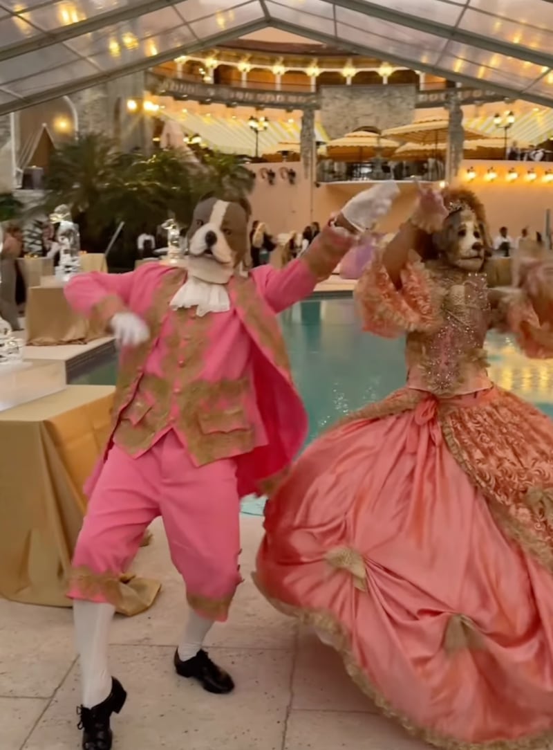 Workers dressed as dogs in 18th-century finery dancing at Mar-a-Lago on January 8, captured on Instagram.