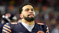 Caleb Williams #18 of the Chicago Bears reacts against the Green Bay Packers during the fourth quarter in the NFC Wild Card Playoff game at Soldier Field on January 10, 2026, in Chicago, Illinois.