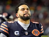 Caleb Williams #18 of the Chicago Bears reacts against the Green Bay Packers during the fourth quarter in the NFC Wild Card Playoff game at Soldier Field on January 10, 2026, in Chicago, Illinois.