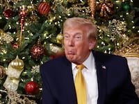 PALM BEACH, FLORIDA - DECEMBER 24: U.S. President Donald Trump calls children as he participates in tracking Santa Claus' movements with the North American Aerospace Defense Command (NORAD) Santa Tracker on Christmas Eve at the Mar-a-Lago resort on December 24, 2025 in Palm Beach, Florida. This is the 70th year that NORAD has publicly tracked Santa’s sleigh on its global rounds. (Photo by Tasos Katopodis/Getty Images)