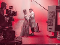 A photo illustration of a movie set and romance scene.
