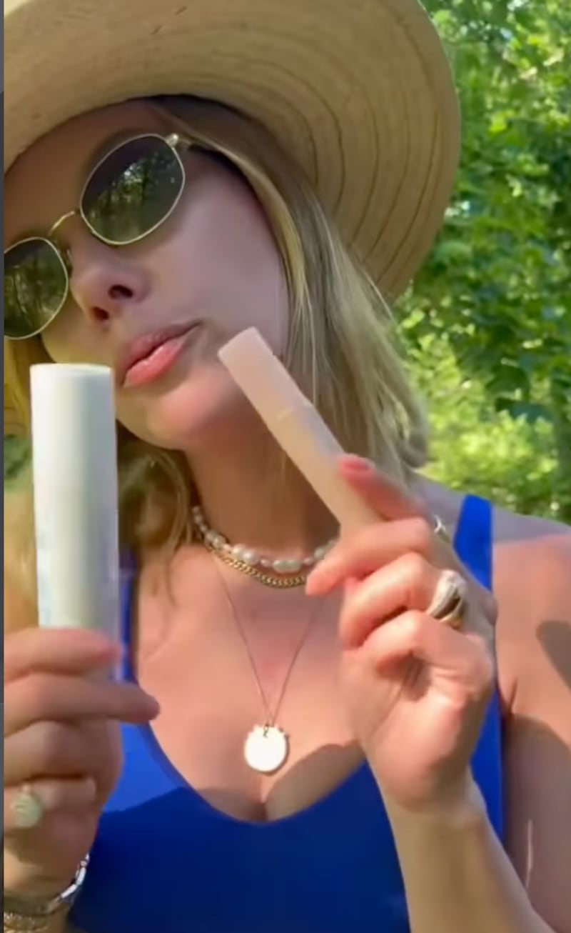 Scarlet Johansson shows off her two summer skincare essentials in an Instagram reel.