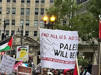 Palestinian-Americans and their supporters march as the conflict between Israel and the Palestinian militant group Hamas continues, in downtown Chicago