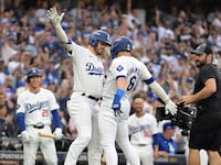 Gavin Lux (left) and Enrique Hernandez.